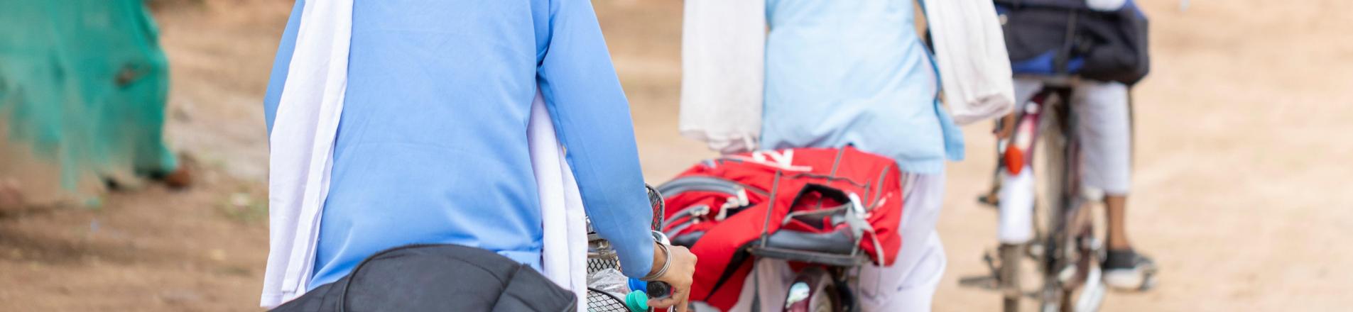 Girls in India on bicycles
