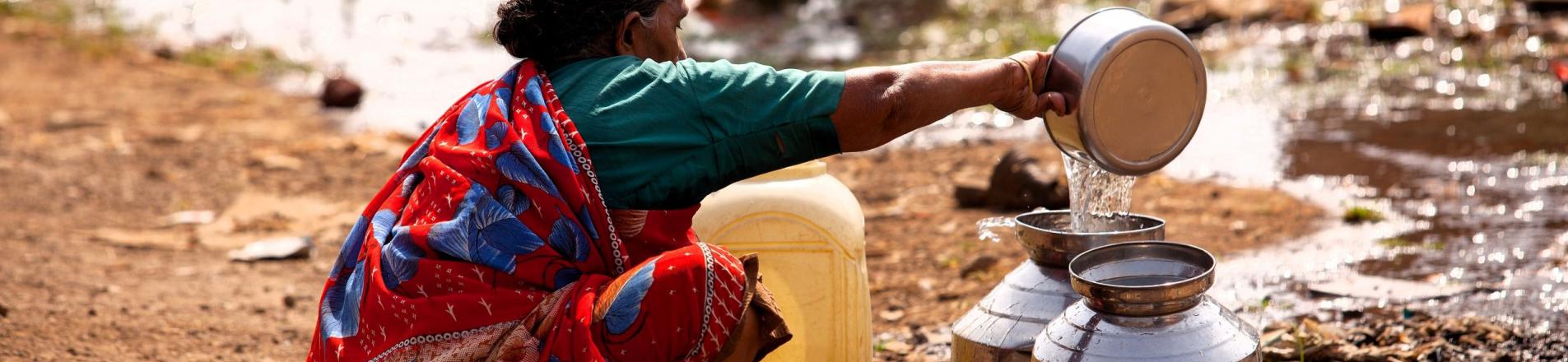 woman collecting water
