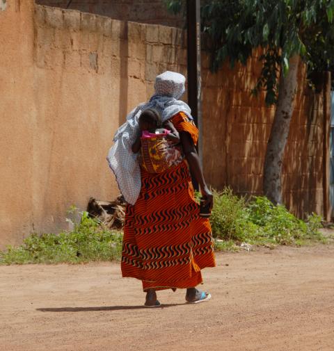 mother with two children in Burkina Faso