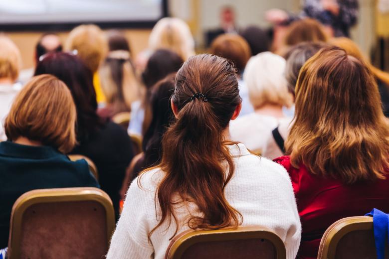 women at a conference