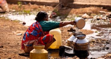 woman collecting water