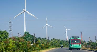 road and wind turbine in India