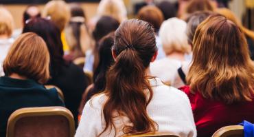 women at a conference
