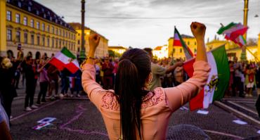 woman protesting in Iran