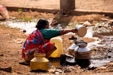 woman collecting water
