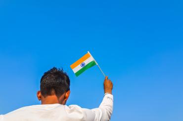 boy waving indian flag