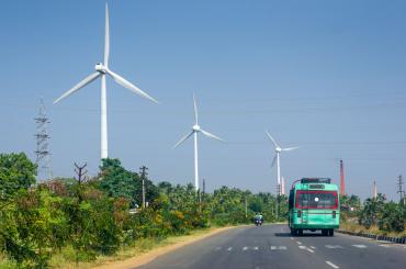 road and wind turbine in India
