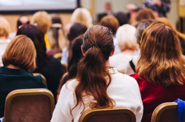 women at a conference