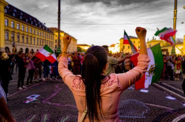 woman protesting in Iran
